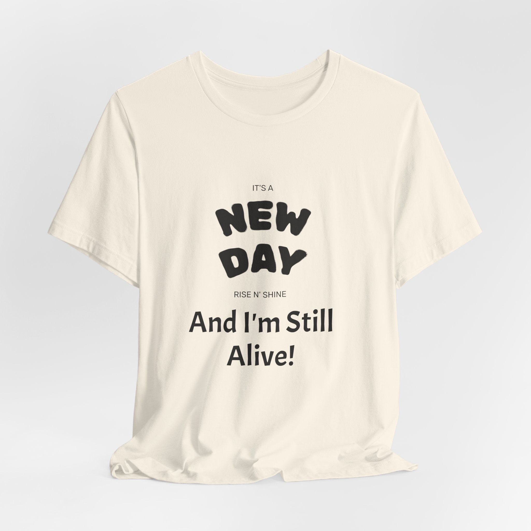 New Day Tee — "And I'm Still Alive" Inspirational Graphic T-Shirt