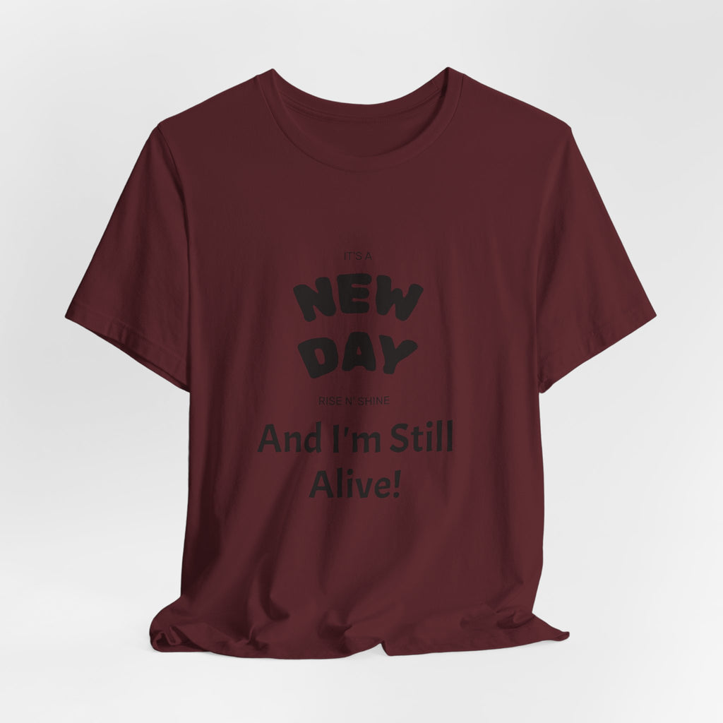 New Day Tee — "And I'm Still Alive" Inspirational Graphic T-Shirt